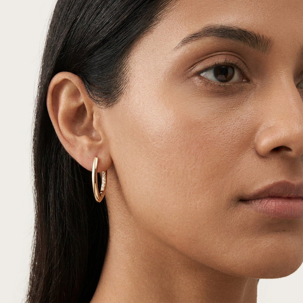 Élan Crystal Curve Earrings in Gold Finish | Minimal Luxury Hoop Earrings by VarnamAyira