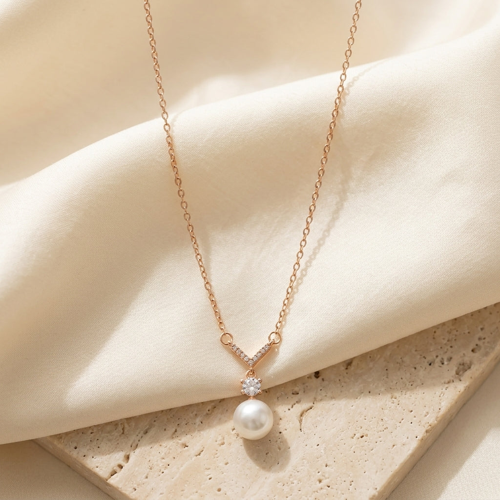 Auréline Pearl V Necklace in Rose Gold Finish | Luxury Crystal Pearl Pendant by VarnamAyira