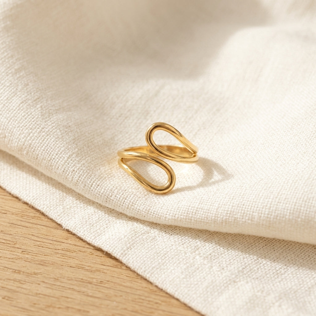 Élan Sculpt Wave Ring in Gold Finish | Minimal Luxury Statement Ring by VarnamAyira