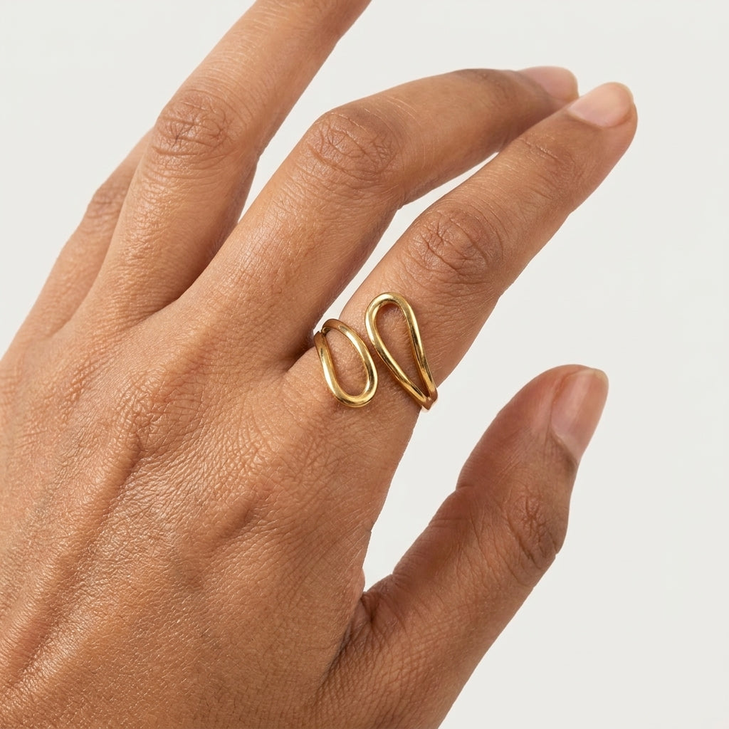 Élan Sculpt Wave Ring in Gold Finish | Minimal Luxury Statement Ring by VarnamAyira