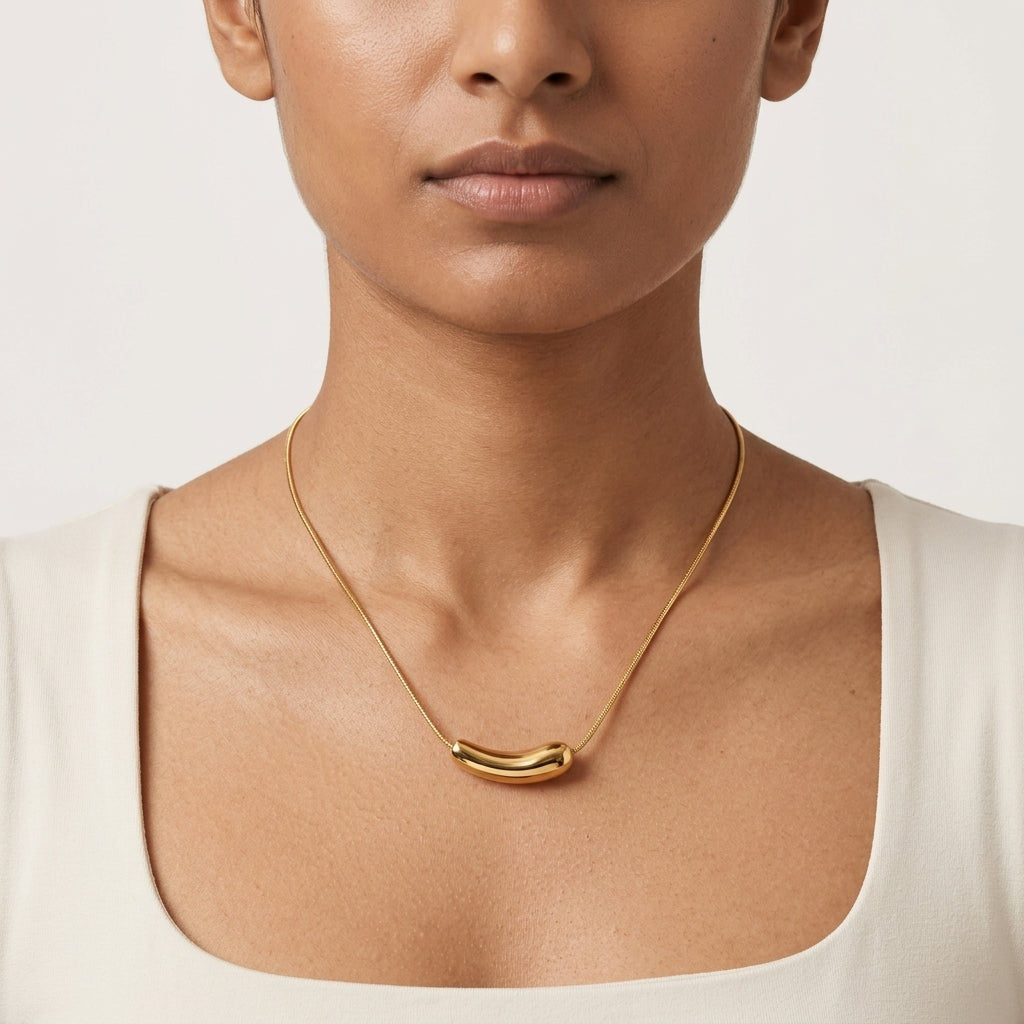Veloura Sculpt Necklace in Gold Finish | Minimal Luxury Statement Necklace by VarnamAyira