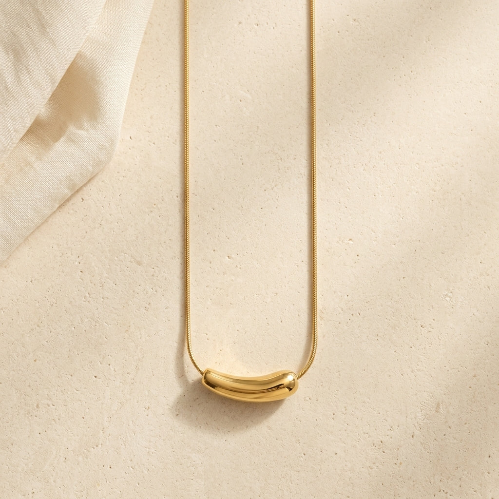 Veloura Sculpt Necklace in Gold Finish | Minimal Luxury Statement Necklace by VarnamAyira